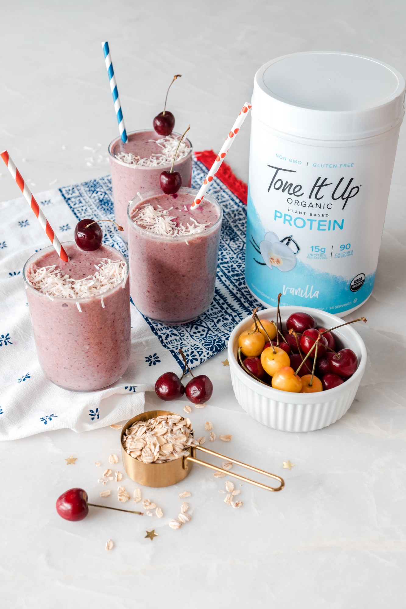 This healthy Cherry Pie Protein Smoothie with Vanilla Tone It Up gluten-free, plant-based protein is perfect for 4th of July.